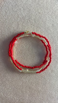 Gold and red waistbead