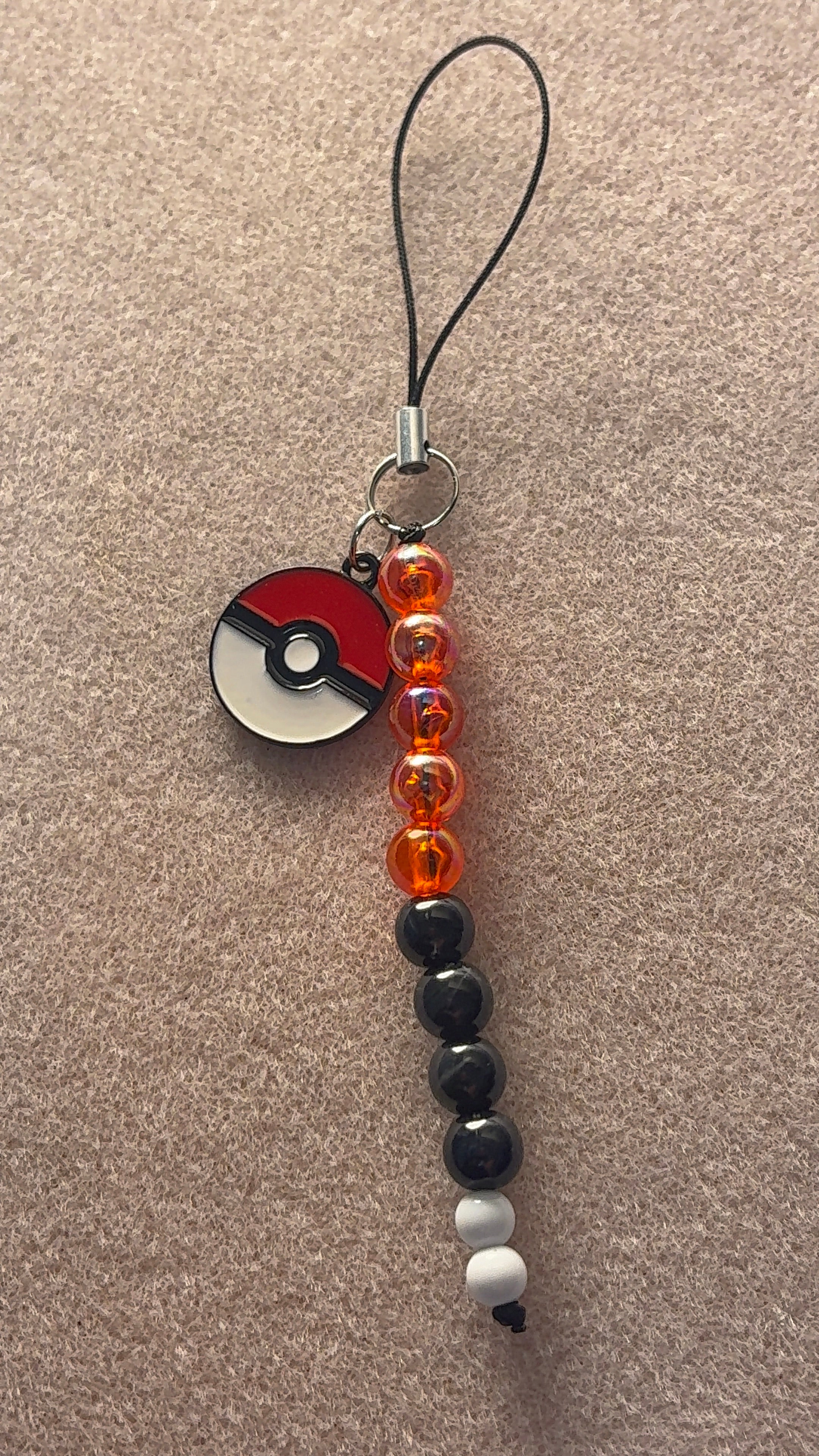 Poké- ball keychain